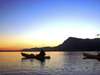Mosaic - canoeing on the lagoon at sunset